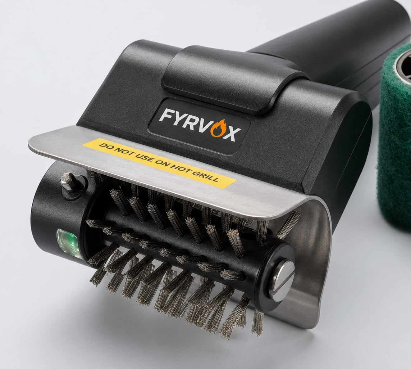 Close-up of the FYRVOX brush stainless shield and dual bristle rollers